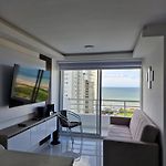 Alojamiento Nuevo en Piso 24 con WiFi Rápido y Vista al Mar, Cerca al Centro Histórico
