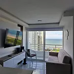 Alojamiento Nuevo en Piso 24 con WiFi Rápido y Vista al Mar, Cerca al Centro Histórico